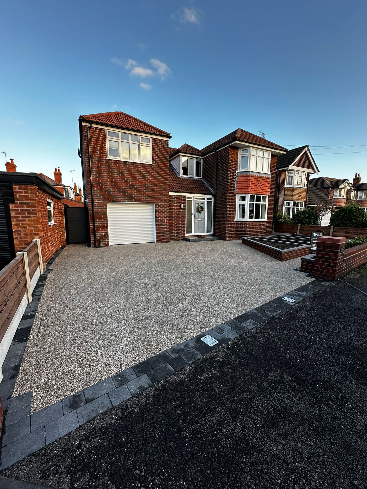Resin bound driveway installed outside a home in Cheshire