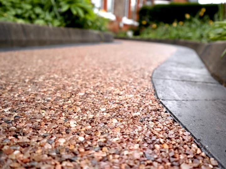 Close-up of a resin bound driveway surface and edging